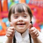 Dr. Parvathi Pokala, a specialized autism pediatric dentist in San Diego, providing sensory-friendly care to a child.